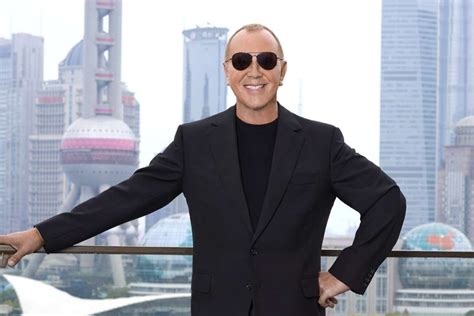 is mk designer - michael Kors fashion designer.